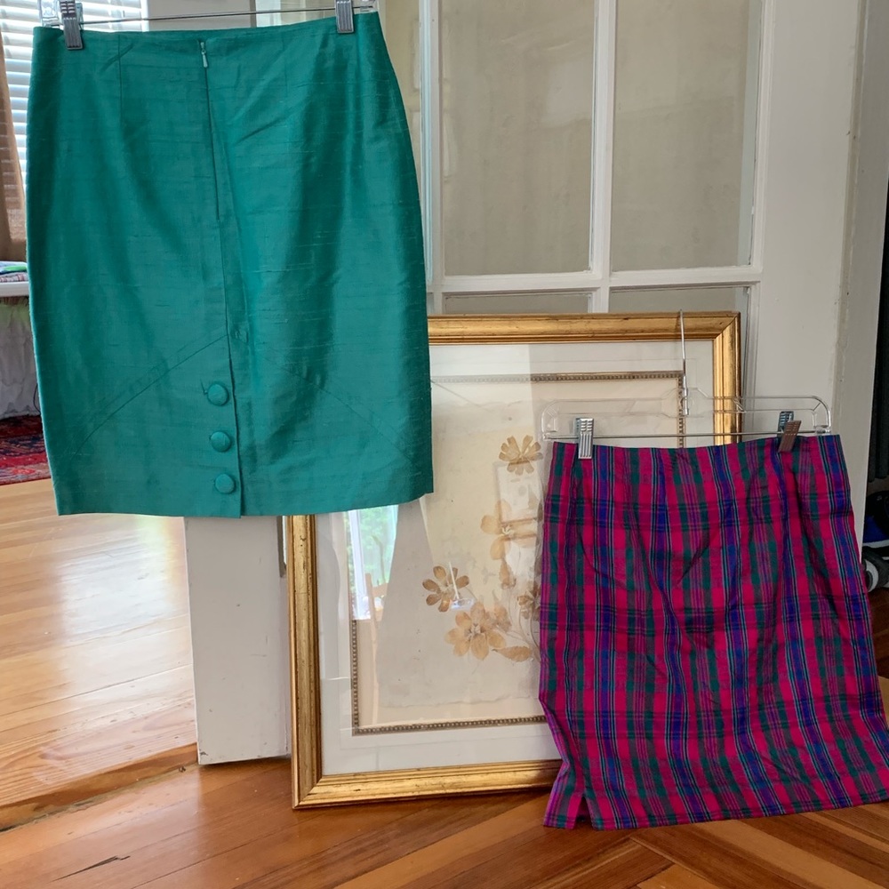 Two 100% silk designer skirts.